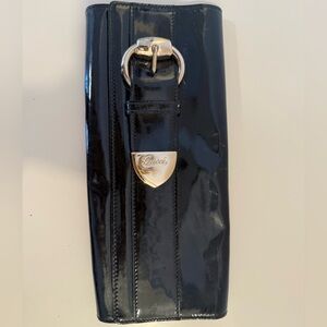 Authentic Gucci Black Patent
Leather Buckle Clutch
